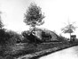 An old picture of a large military tank in the park