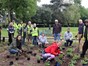 Group of planting volunteers at Brinton Park's new pollinator garden