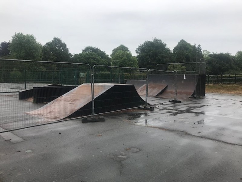 skate park surrounded by high fencing